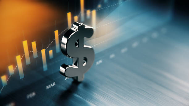 American Dollar Symbol Standing On Wood Surface In Front Of A Graph American dollar symbol standing on wood surface in front of a graph. Selective focus. Horizontal composition with copy space. Money Exchange Storck stock pictures, royalty-free photos & images